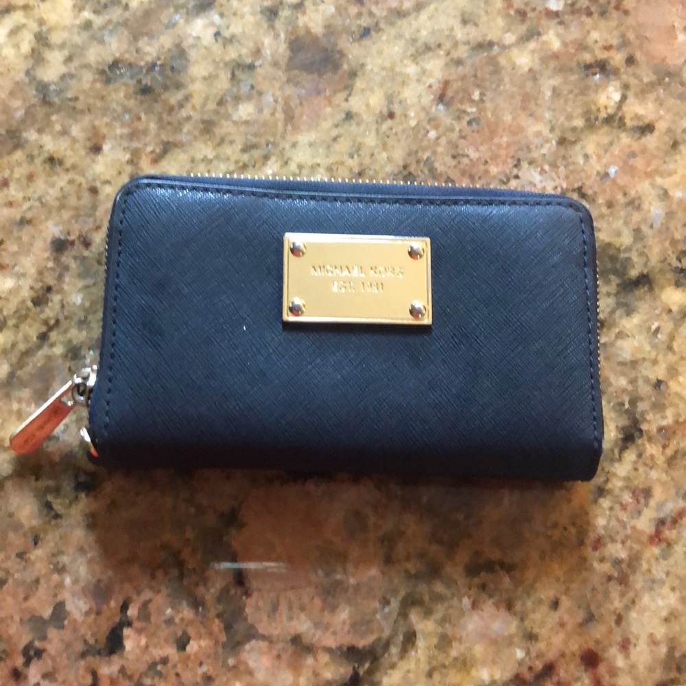 Michael Kors ladies zip wallet.